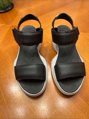 Sorel Black Sandals with Yellow Accent and White Soles
